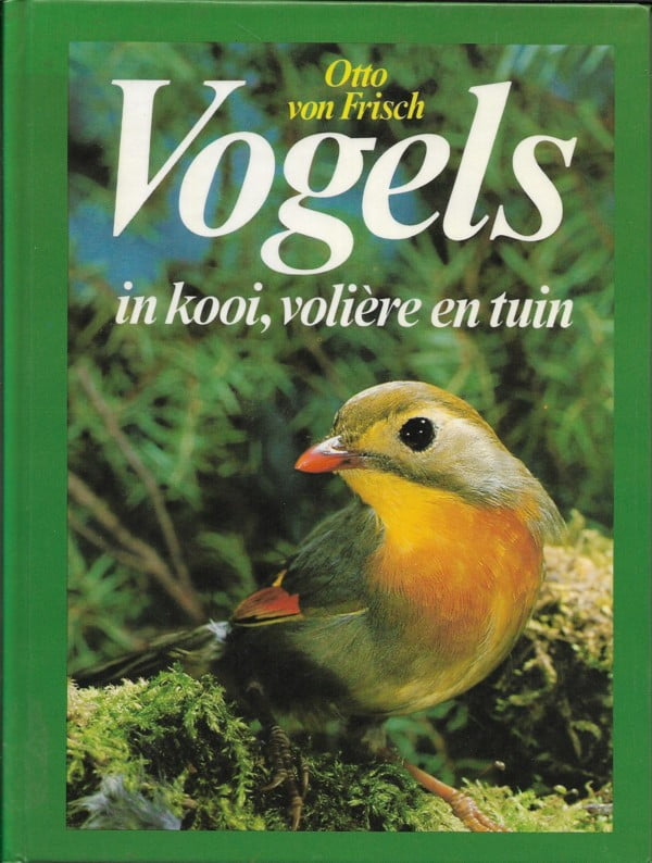 Vogels in kooi, volière en tuin